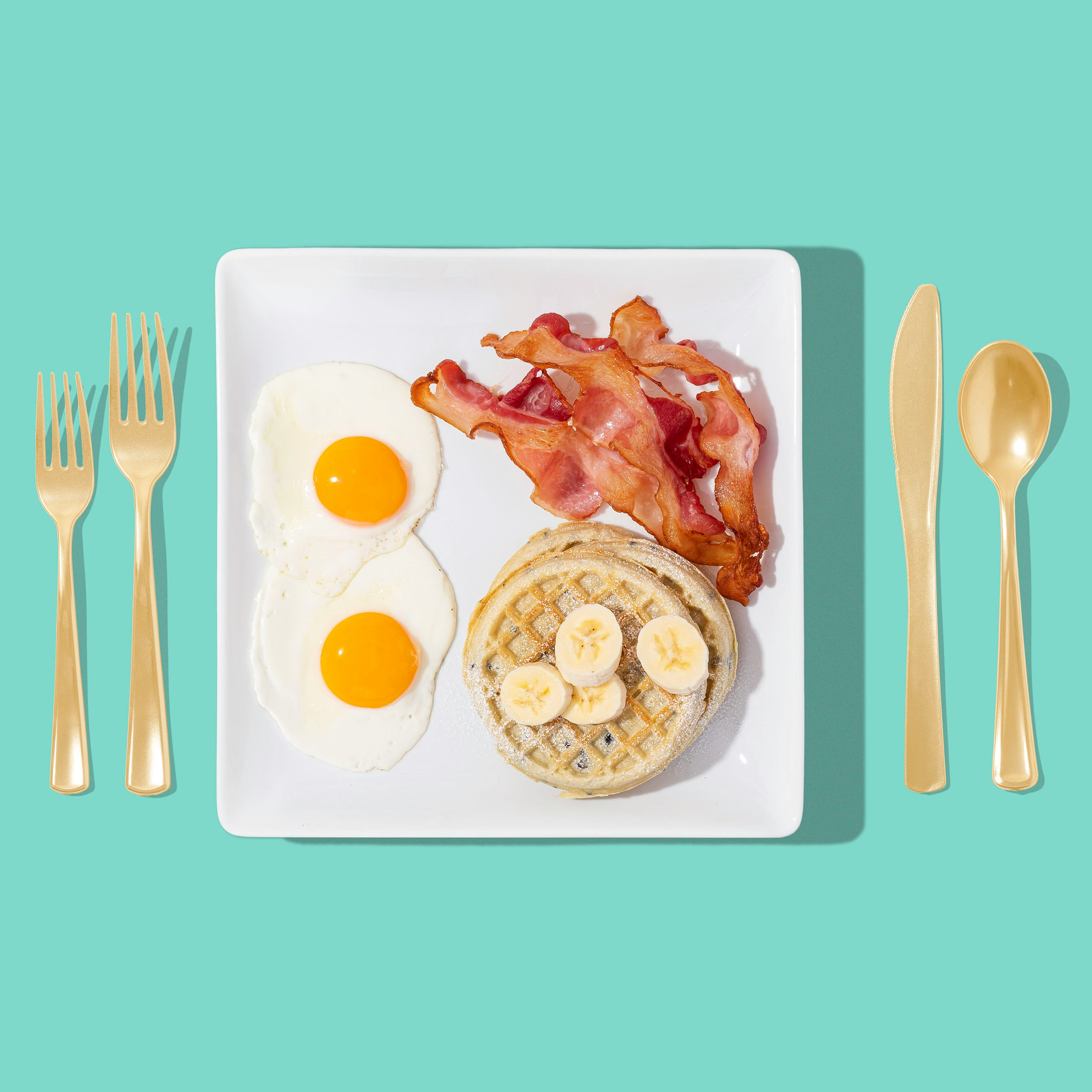 white ceramic plate with food and stainless steel fork